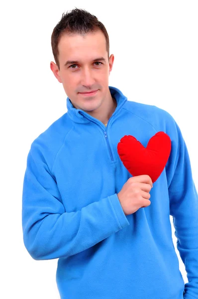 Young man holding heart — Stock Photo, Image