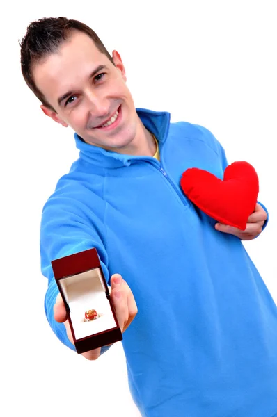 Young man holding heart — Stock Photo, Image