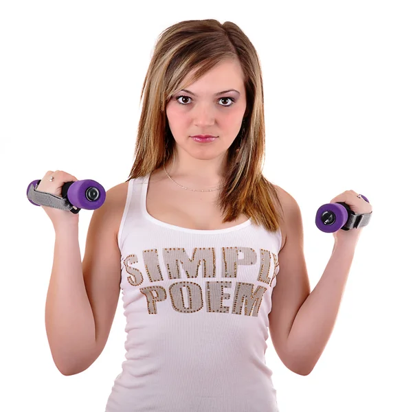 Portrett av en egnethavende kvinne som trener med gratis vekt i gym – stockfoto