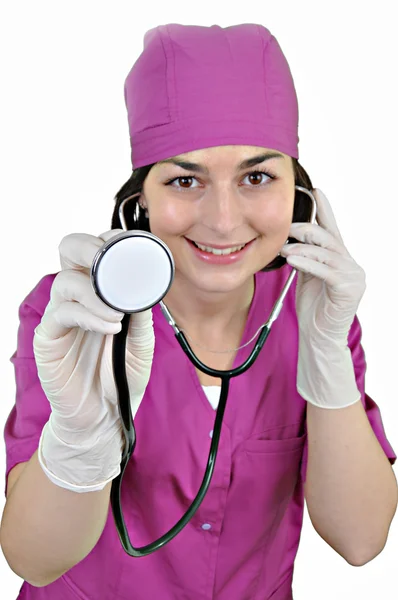 Médico senhora atraente em um fundo sobre branco — Fotografia de Stock