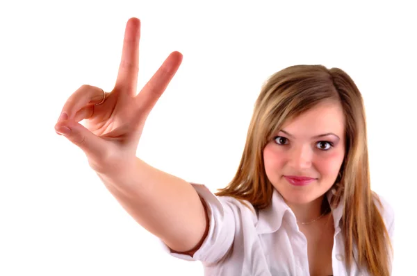 Woman showing victory sign Stock Picture
