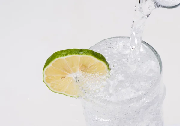 Pouring water intgo glass — Stock Photo, Image