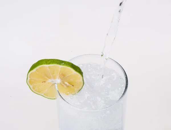 Pouring water into glass — Stock Photo, Image