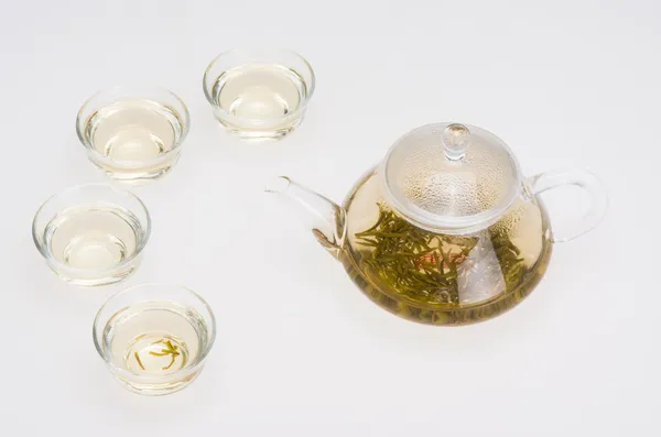 Teapot and tea cup on table — Stock Photo, Image