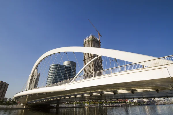Modern bridge and building in Tianjin city of China — Stock Photo, Image