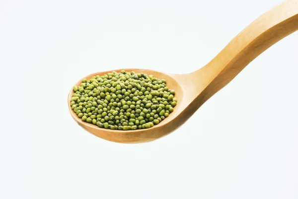 大さじで緑色の豆 — ストック写真