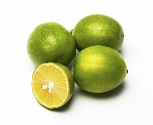 Fresh limes on white background — Stock Photo, Image