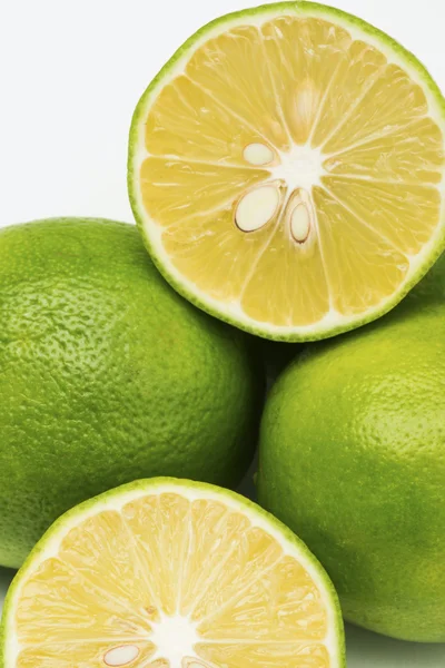 Fresh limes on white background — Stock Photo, Image