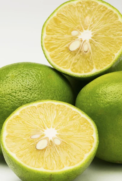 Fresh limes on white background — Stock Photo, Image