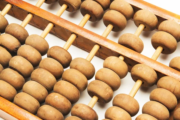 Abacus close-up em fundo branco — Fotografia de Stock