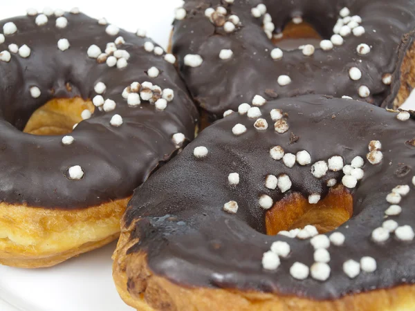 Donuts estão em um chocolate — Fotografia de Stock