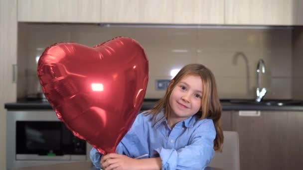 Valentines day at home, girl with heart balloon online, celebration of february 14 distance, virtual Valentines Day — Stock videók