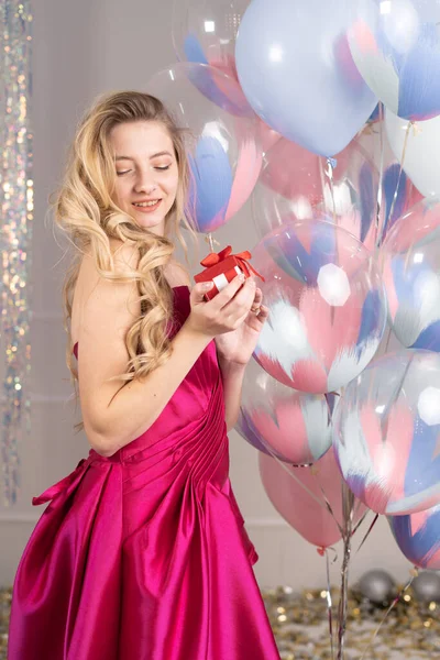 Cheerful Young Beautiful Woman Dress Stands Alone Red Dress Balloons — стоковое фото