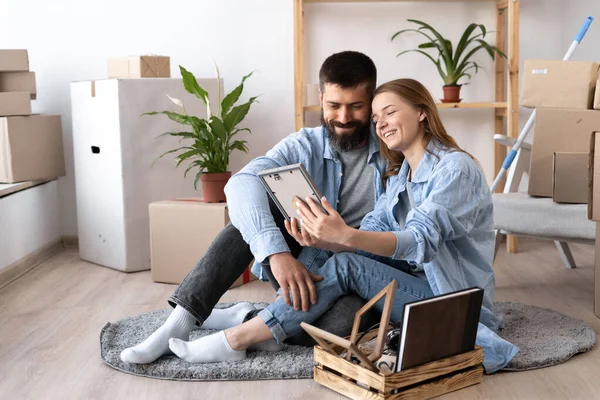 Happy Young Couple Sit Floor Casual Clothes Hugging Looking Framed — Fotografia de Stock