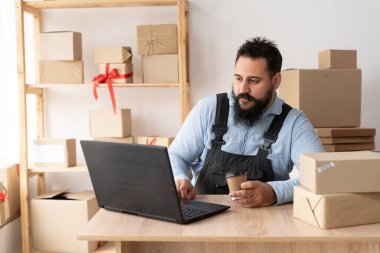 Small business startup, Indian SME entrepreneur or freelance worker working from home, online sale concept, e-commerce, delivery. Online marketing packaging and delivery. copy space