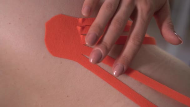 Kinesio Taping Back Effective Method Treating Pain Clinic Elastic Bands — Stock Video