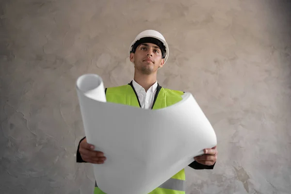 Young Arabic Architect Man Helmet Holding Blueprints Isolated Grey Background — Stockfoto