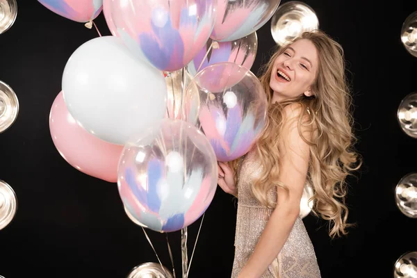 Attractive Young Woman Dress Balloons Black Background Looking Camera Emotions — стоковое фото