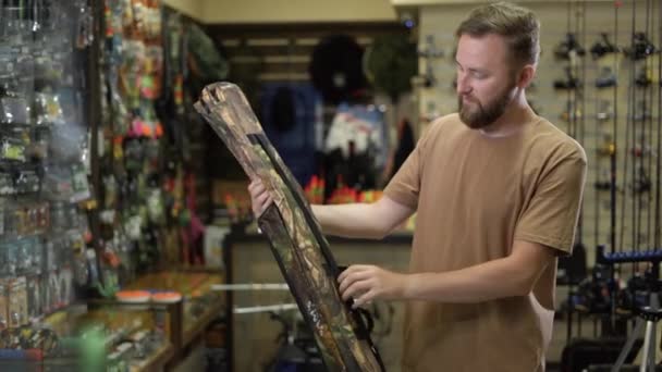 Caucasian Bearded Man Fishing Tackle Shop Getting Ready Fishing Trip — Vídeos de Stock
