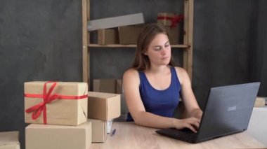 start-up small business entrepreneur, small and medium business freelancer working with box, young girl business owner feels headache while working. overwork concept
