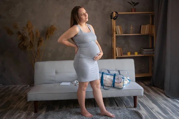 Pregnant Woman Dress Holding Her Hands Stomach Living Room Interior — стоковое фото
