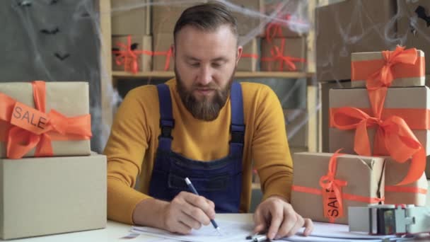 Bearded Man Glasses Business Owner Sits Halloween Decorated Home Office — 비디오