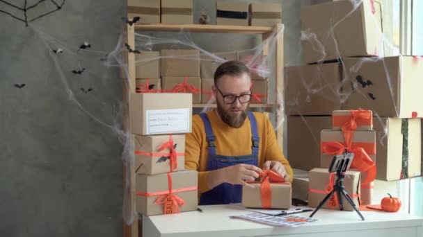Young Bearded Man Glasses Business Owner Sits Halloween Decorated Home — Vídeo de Stock