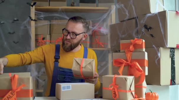 Young Bearded Man Glasses Business Owner Sits Halloween Decorated Home — Stockvideo