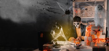 Successful small business owner, freelance makeup artist skeleton preparing package for delivery to customers, small and medium business entrepreneurs, halloween sale, promotions. Banner. copy space.