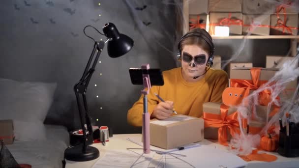 Dropshipping Owner Halloween Makeup Witch Costume Prepares Goods Shipment Takes — Vídeo de Stock
