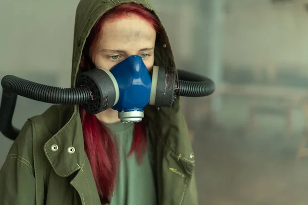 Post apocalypse female survivor in oxygen mask. Close up