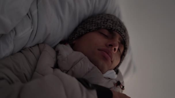 Cold Bed Winter Coat Blanket Heating Home Man Sleeps Hat — Stock Video