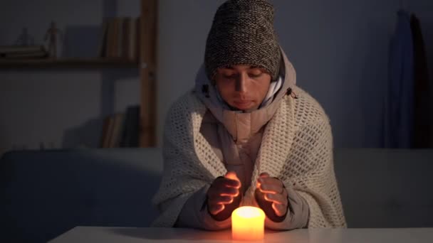 Man Dressed Warm Winter Hat Scarf Sits Home Table Warms — Stock Video