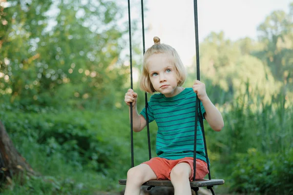 Adorable Little Boy Long Blond Hair Swings Fresh Air Sunny — Stok Foto