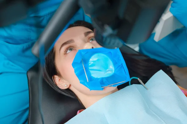 Closeup Portrait Female Patient Cofferdam System Modern Dental Office Dental — стоковое фото