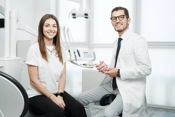 Happy Male Dentist Wearing White Coat Sitting Dental Unit Caucasian — Fotografia de Stock