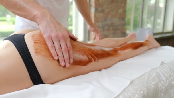 Chocolate Scrub Poured Woman Action Filling Body Scrub Spa Treatment — Video Stock