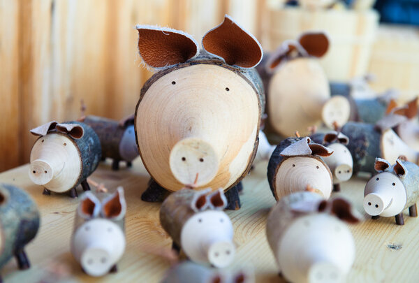 Cute wooden pigs