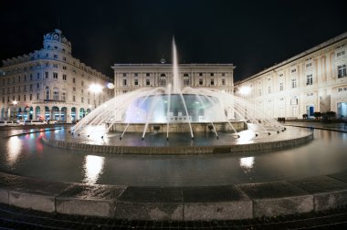 Fountain in De Ferrari square in Genoa, Italy clipart