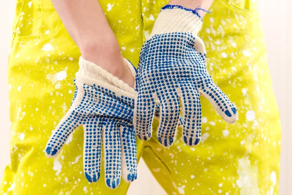 Female construction worker in coverall and protective gloves — Stock Photo, Image