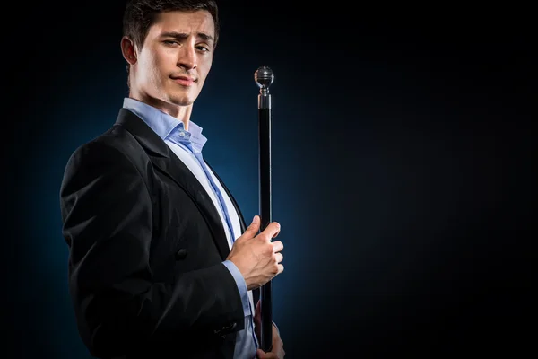 Man holding cane — Stock Photo, Image