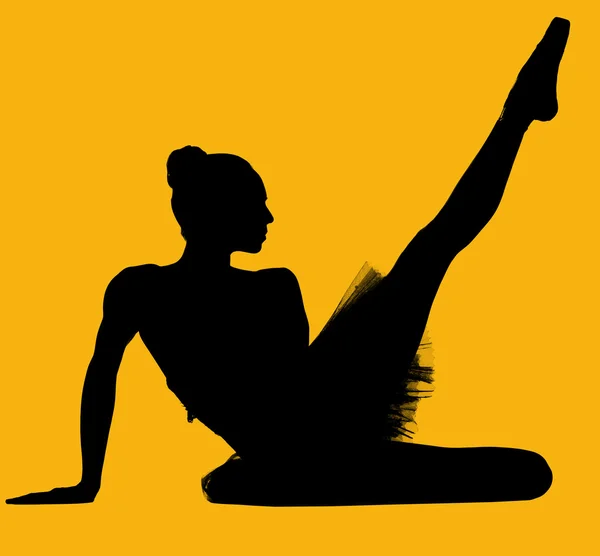 Black silhouette of ballerina isolated over yellow background — Stock Photo, Image