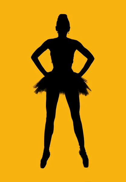 Black silhouette of ballerina isolated over yellow background — Stock Photo, Image