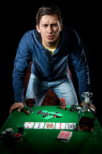 Agressive young gambler indoors — Stock Photo, Image