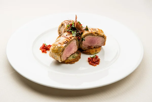 Roasted juicy beef steak with potato pancakes — Stock Photo, Image