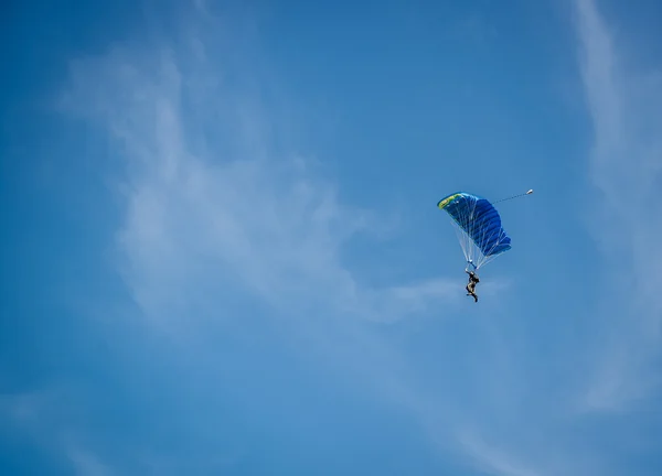 Parachutist over sky background — Stock Photo, Image