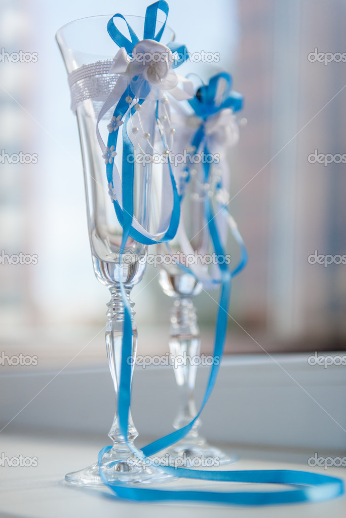 Champagne Glasses Decorated With Blue White Ribbons Stock Photo