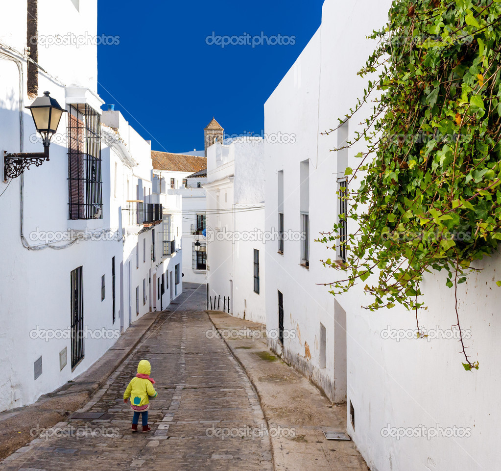 Baby walking on narrow street of Vejer de la Frontera
