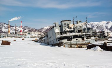 View of Petropavlovsk-Kamchatsky deserted vessels and power plant clipart