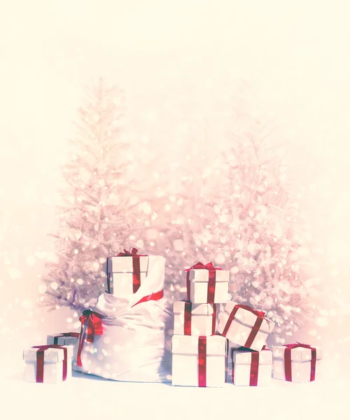 Christmas trees with heap of gift boxes — Stock Photo, Image